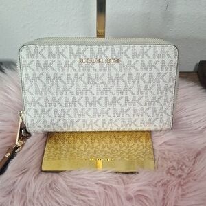 Michael Kors Cream Monogram Clutch